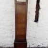 Art Deco Grandmother clock with alloy face and copper digits