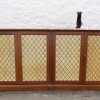 A Regency mahogany stained four door bookcase with marble top