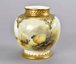 A Royal Worcester hand painted segment vase