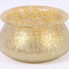 Loetz iridescent glass bowl with yellowed ground and textured design, 19cm diameter.