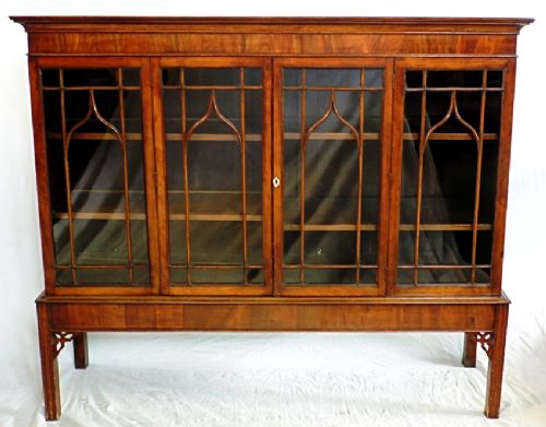 Georgian mahogany two door astragal glazed bookcase on stand