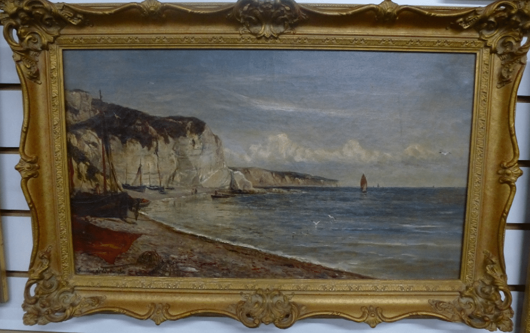 Gustave de Breanski, a 19th Century of coastline scene with figures and boats, signed, 59 x 33.5cms