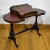 A Victorian Burr Walnut Kidney top Writing table
