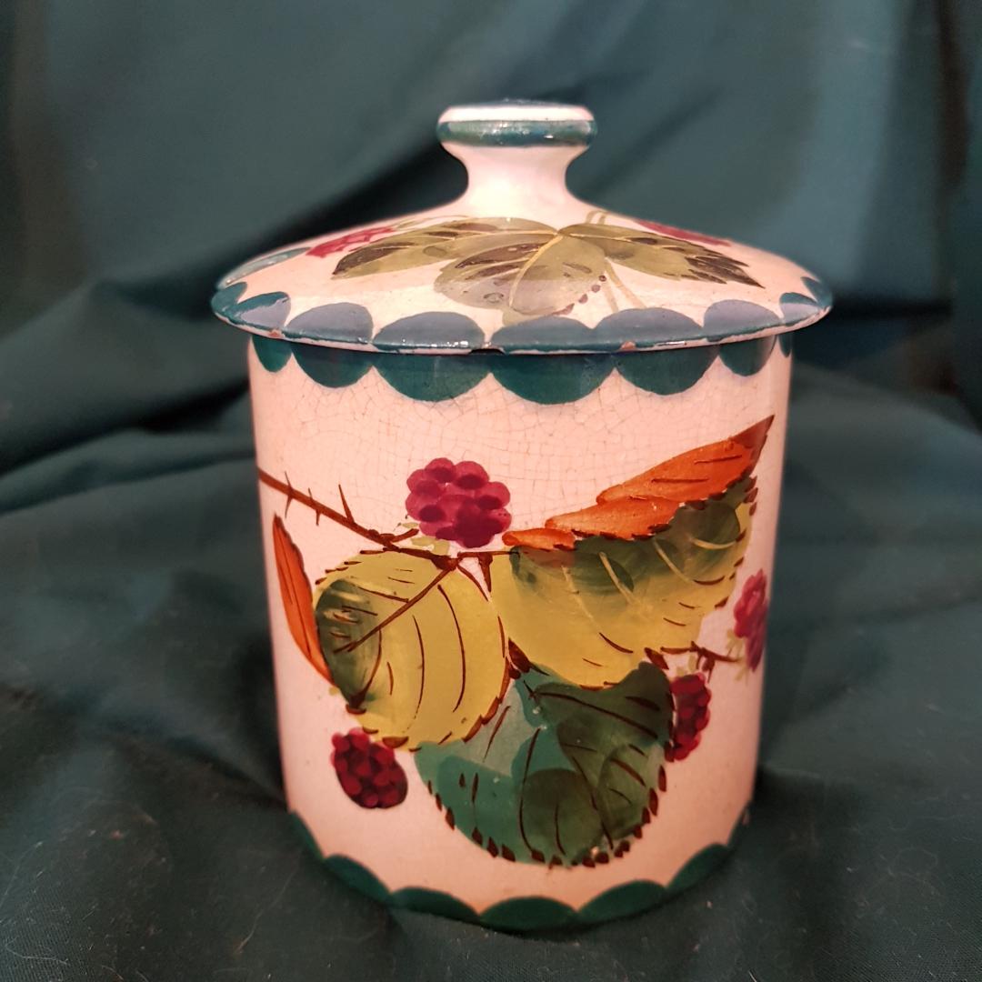 Wemyss ware jam pot decorated with raspberries