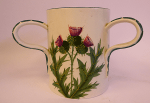 A Wemyss ware pottery Tyg. Thistles.