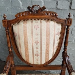 Pair French 19th century carved open arm chairs.