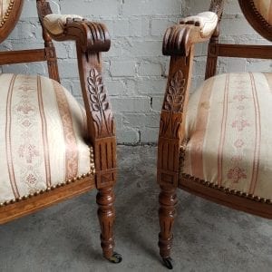 Pair French 19th century carved open arm chairs.