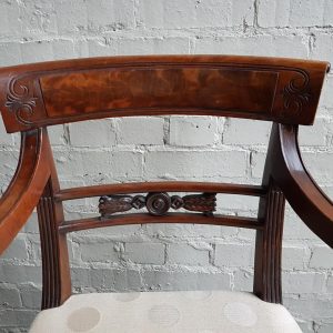 A superb set of 10 Regency period mahogany sabre leg chairs Incl; Two carvers