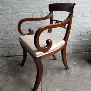 A superb set of 10 Regency period mahogany sabre leg chairs Incl; Two carvers