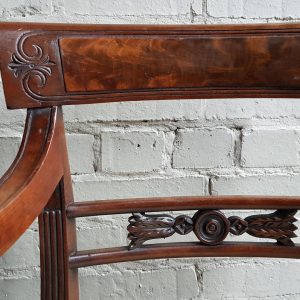 A superb set of 10 Regency period mahogany sabre leg chairs Incl; Two carvers