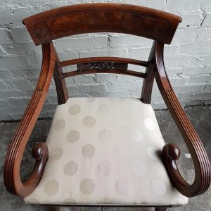A superb set of 10 Regency period mahogany sabre leg chairs Incl; Two carvers