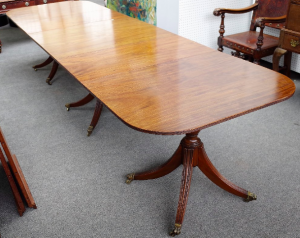 A 19th century Three pedestal mahogany dining table
