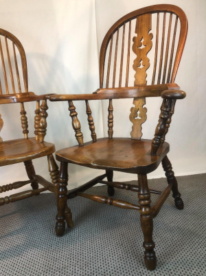 A pair pad arm elm Victorian Windsor Chairs