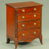 A Georgian style four drawer chest of drawers