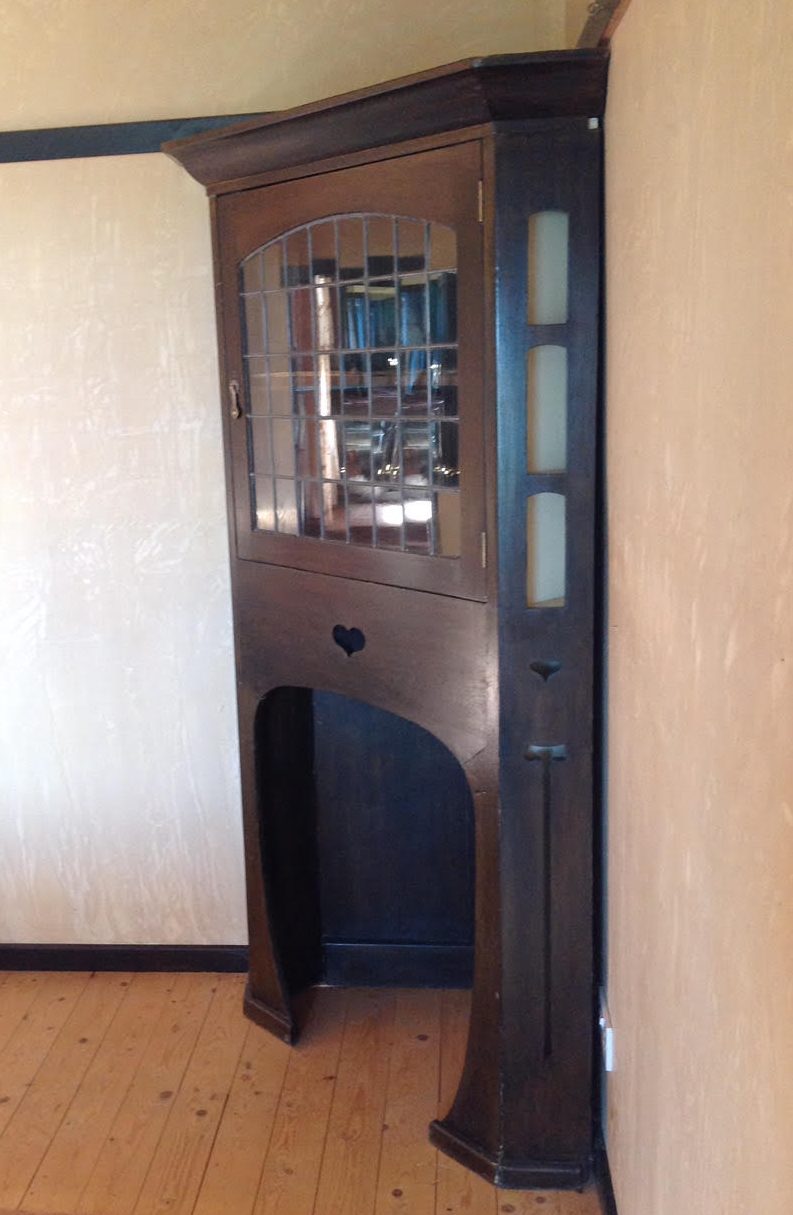 Arts & Crafts oak corner cabinet