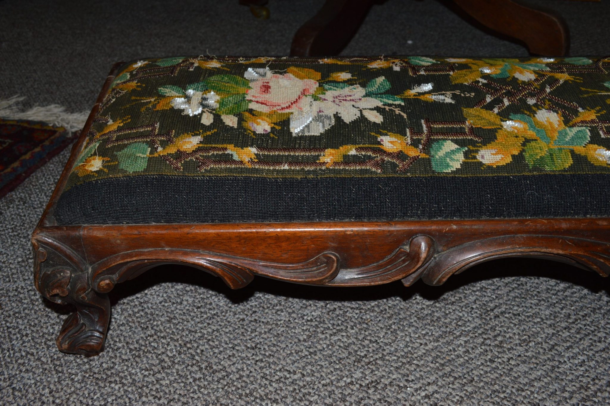 A Victorian Tanzi foot stool A Victorian Tanzi foot stool