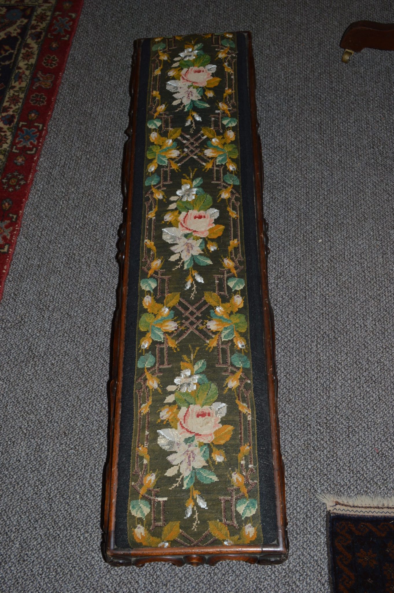 A Victorian Tanzi foot stool A Victorian Tanzi foot stool