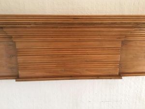 A Victorian pine fire surround