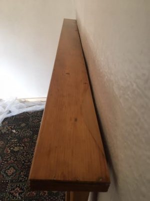 A Victorian pine fire surround
