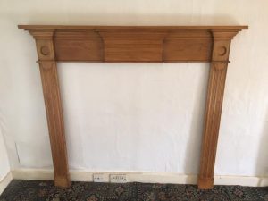 A Victorian pine fire surround