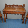 Victorian carved oak hall table and matching side chairs