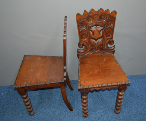 Victorian carved oak hall table and matching side chairs