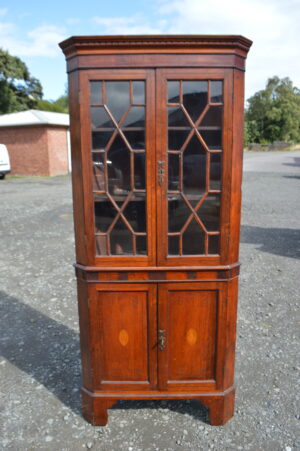 Georgian oak corner cabinet on base