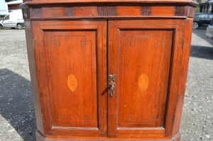 Georgian oak corner cabinet on base