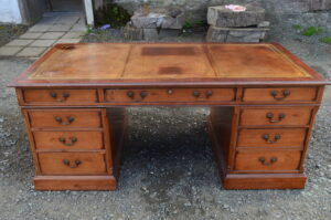 A late 20th cent mahogany partners desk.