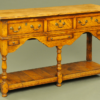 A Georgian style light oak dresser base.