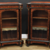 A pair of Victorian gilt metal mounted amboyna and ebonised