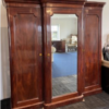 A Victorian mahogany three door breakfront wardrobe