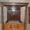 Victorian oak four poster bed.
