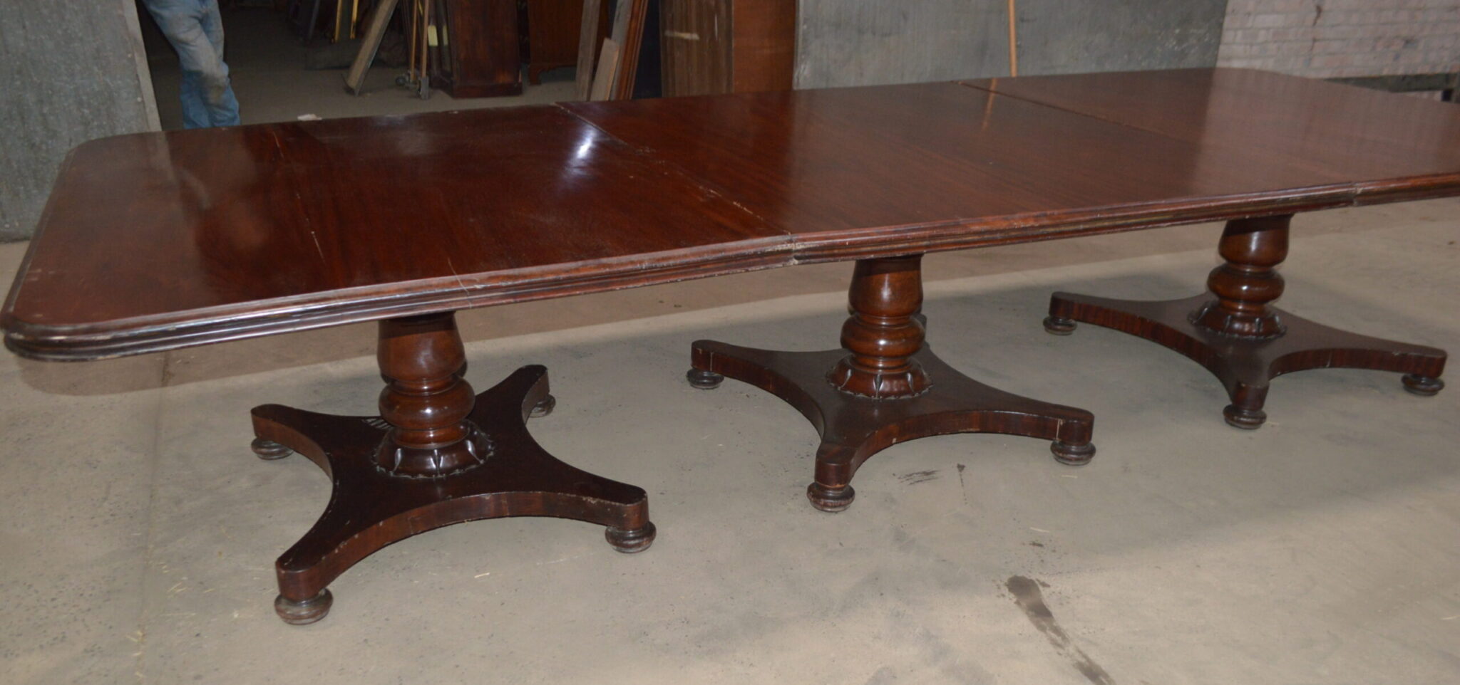 A large William IV mahogany three pedestal dining table.