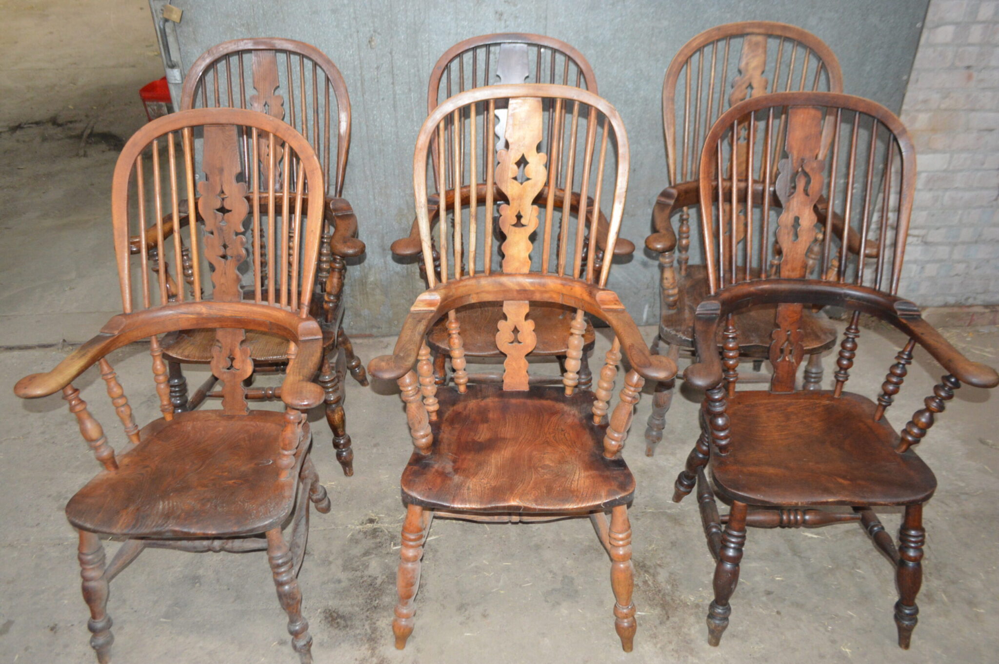 Six Victorian high back Windsor chairs.