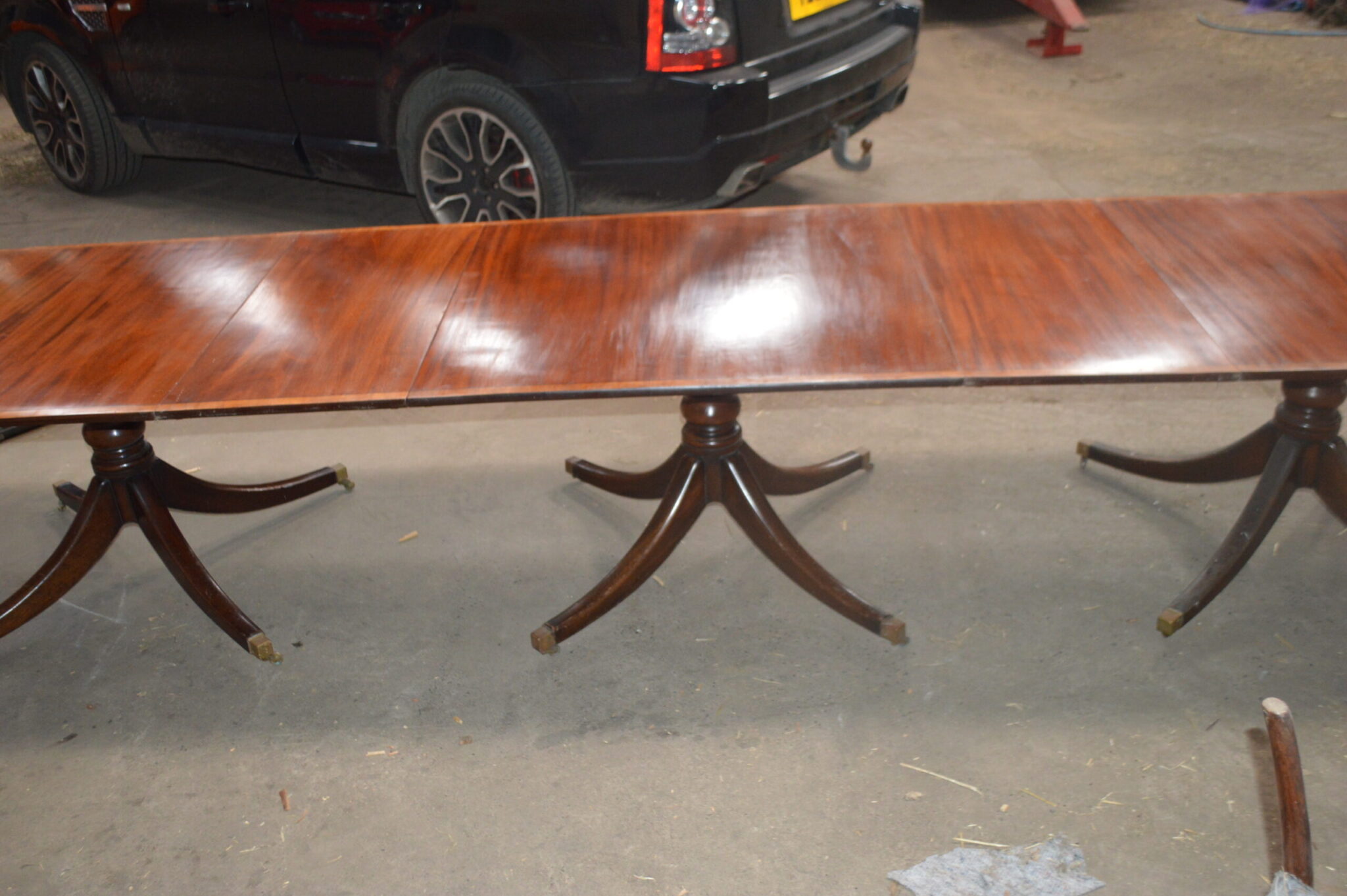 14 ft Victorian mahogany three pedestal dining table.