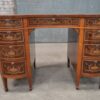 A fine Edwardian mahogany and satinwood inlaid kidney desk