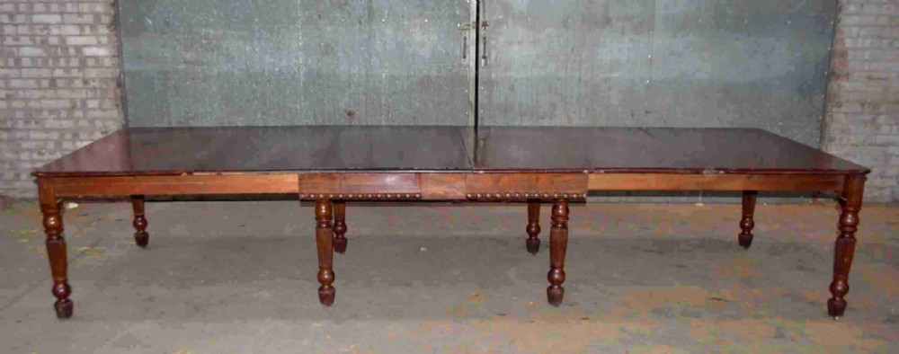 Gillows type extending dining table.