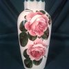 Wemyss ware oviform vase decorated with red roses