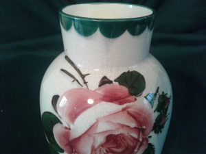 Wemyss ware oviform vase decorated with red roses