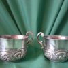 2 small Antique silver loving cups.
