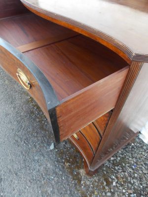 Georgian Serpentine mahogany chest of drawers. Antique furniture online.