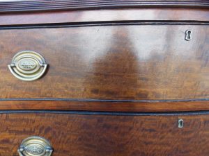 Georgian Serpentine mahogany chest of drawers. Antique furniture online.