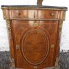 Serpentine French Louis ormolu Burr walnut cabinet.