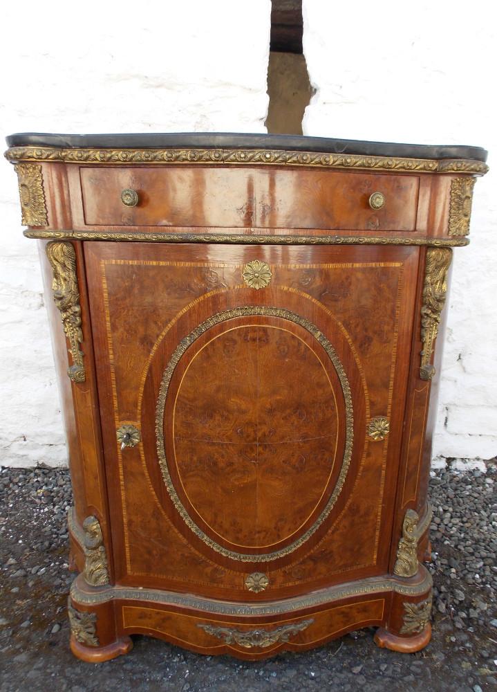 Serpentine French Louis ormolu Burr walnut cabinet.