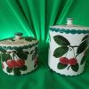 A Wemyss pottery cylindrical biscuit barrel with cover,