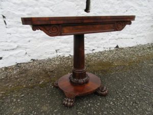 William 1V rosewood fold over card table.