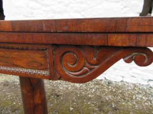 William 1V rosewood fold over card table.