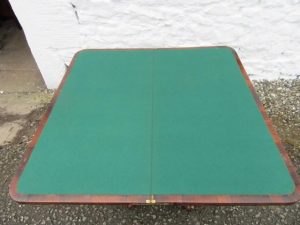William 1V rosewood fold over card table.