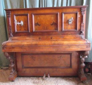 Berlin overstrung over damper walnut cased piano